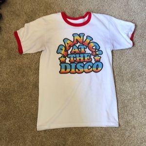 white with rainbow lettering “panic at the disco”